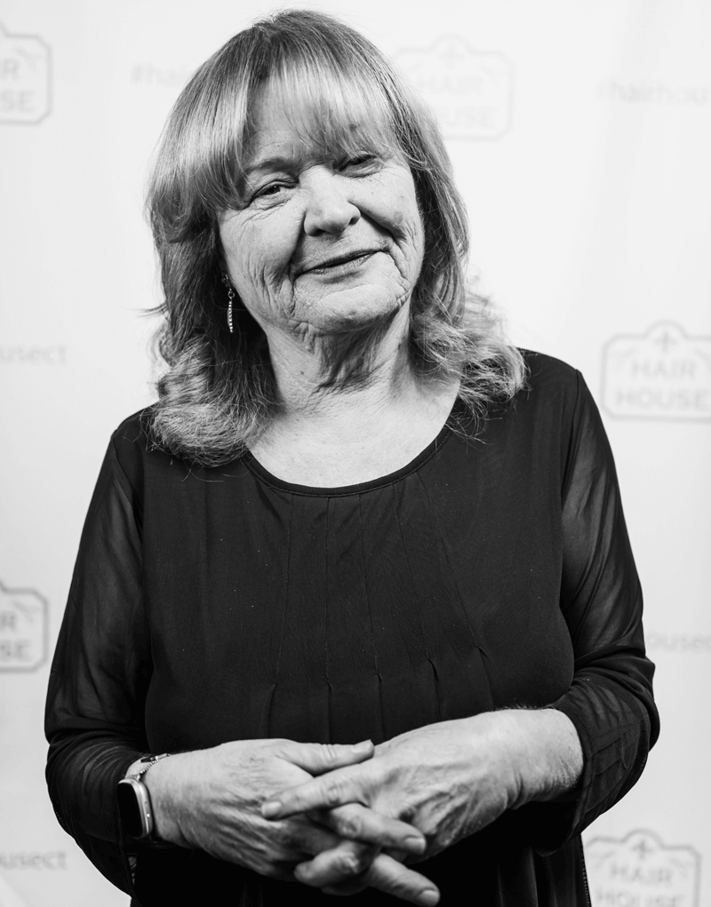 headshot of Loretta, a stylist at Hair House Salon in Milford CT